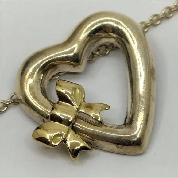 Tiffany & Co Silver Heart with 18kt Gold Ribbon Bow Necklace - Picture 8 of 11